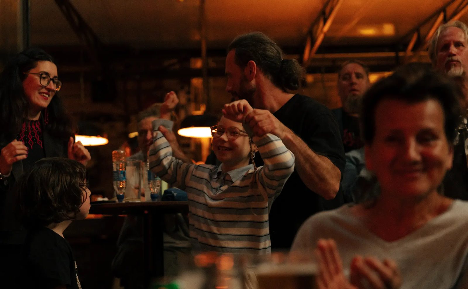 Audience dancing during the final concert